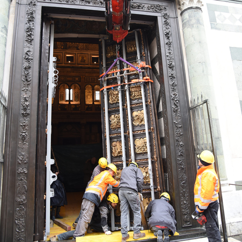 The North Door Replica being placed in the Florence Baptistery to substitute the original work of art